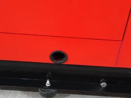 Salida de drenaje de aceite